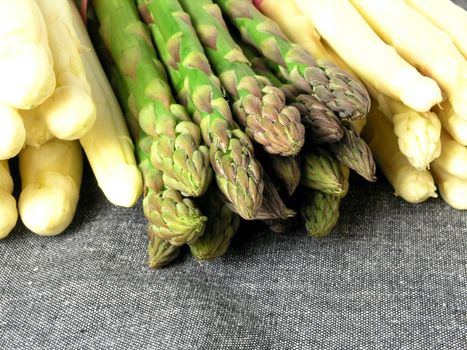  bunch of asparagus isolated on dark background