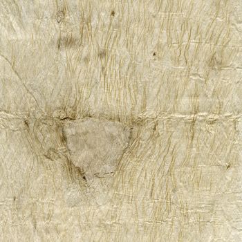 handmade paper background with rought texture, wrinkles, wholes, patches and fiber pattern