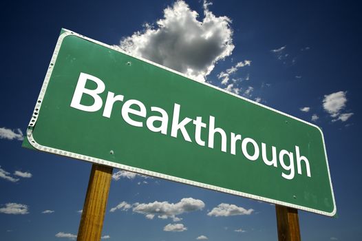 Breakthrough Road Sign with dramatic clouds and sky.
