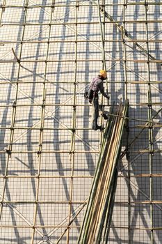 building a scaffold with bamboo in Hong Kong