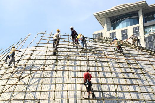 building a scaffold with bamboo in Hong Kong