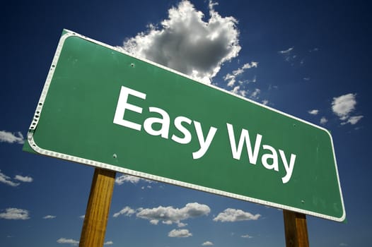 Easy Way Road Sign with dramatic clouds and sky.