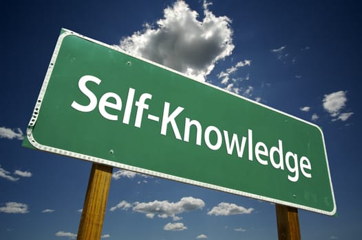 Self-Knowledge Road Sign with dramatic clouds and sky.