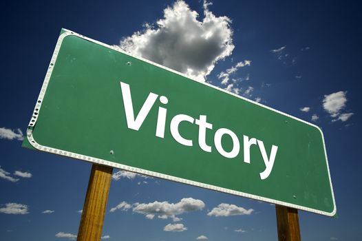 Victory Road Sign with dramatic clouds and sky.
