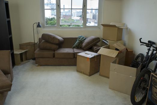 unpacking boxes after moving into a new apartment