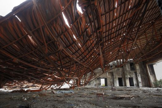 discarded building, metal roof fall down