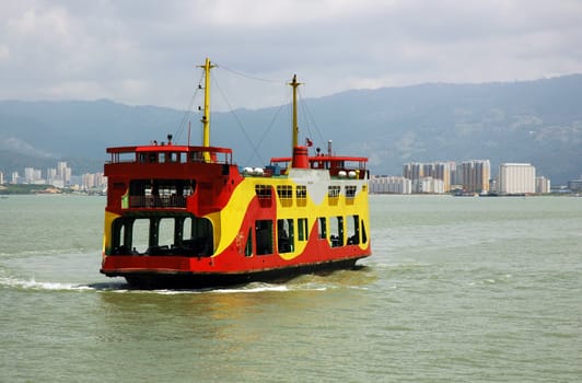Colorful ferry at the sea in Penang Island Malaysia