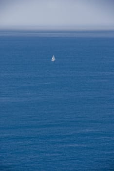 Sail boat in the lonely seas