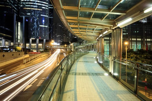 a modern footbridge at night