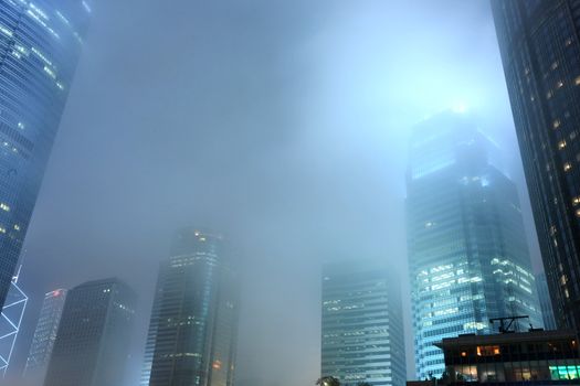 skyscraper in mist at Hong Kong