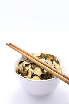 bowl of money with chopsticks