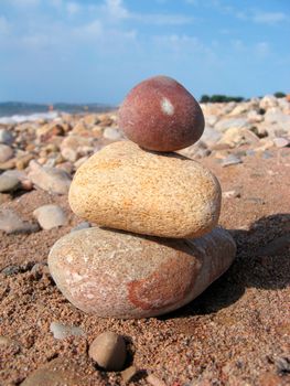 stack of pebbles on the sea shore