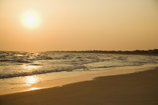 Scenic coastline at sunset.