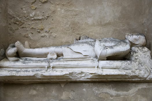 Sculpture memorial of man in Igreja do Carmo, Lisbon, Portugal.