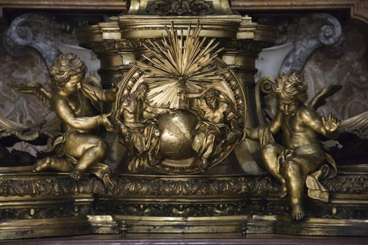 Sculpture of cherubs and Creation in Saint Peter's Basilica, Rome, Italy.