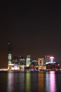 hong kong at night, many tall buildings