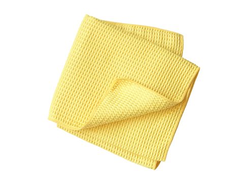 Yellow tea towel isolated on white background with clipping path