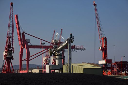 Dockside machinery and imported coal at Avonmouth docks