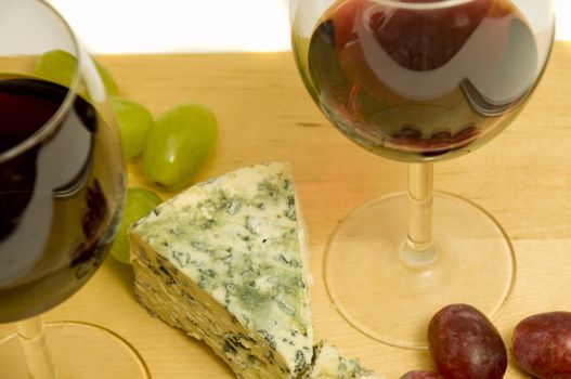 french eating delights with wine and cheese, on white background