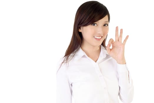 Ok sign of business woman image on white background.
