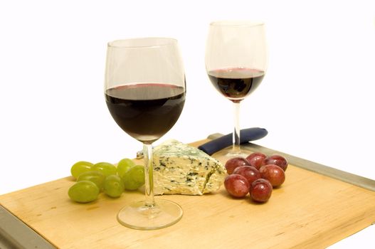 french eating delights with wine and cheese, on white background