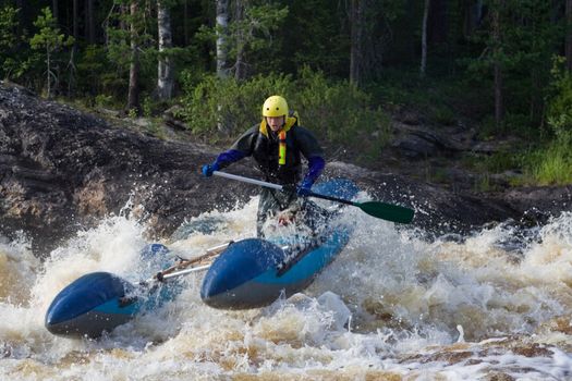 sportsman in the rapid
