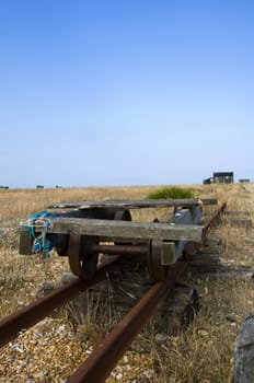 Old abandoned rail track on the beach at Dungeness