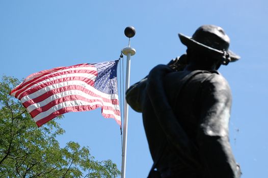 Statue and Old Glory