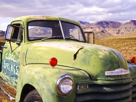Vintage green pick up truck on historic Route 66, USA