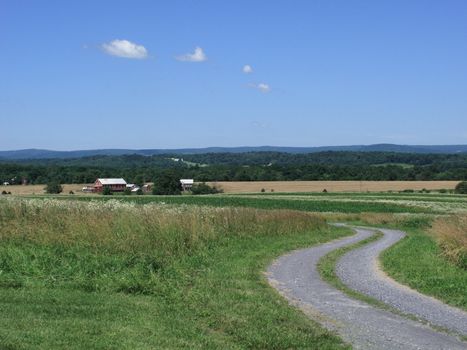 A back road winds through farms in Pennsylvania
