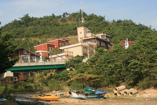 Resort in Taehan city Korea with boat and dried river