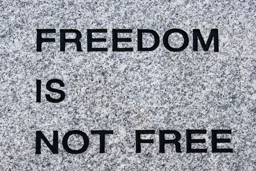 Freedom is not free etch in marble located at war memorial in korea