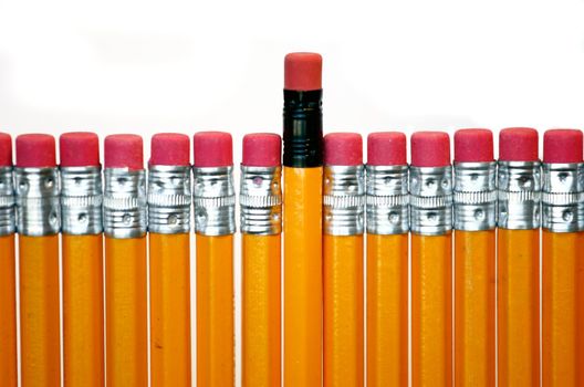 celebratory pencil among usual pencils from the center
