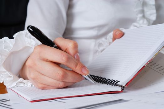 young businesswoman sign important documents