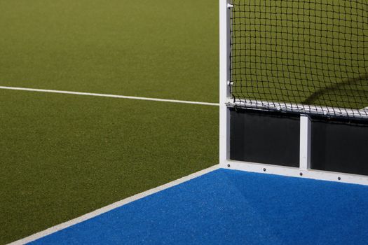 Abstract view of hockey goals on an Astroturf playing field