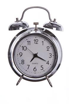 Old style alarm clock isolated on a white background