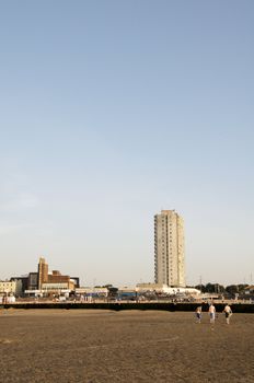 A view from Margate  beach in the late afternoon with buildings in the background