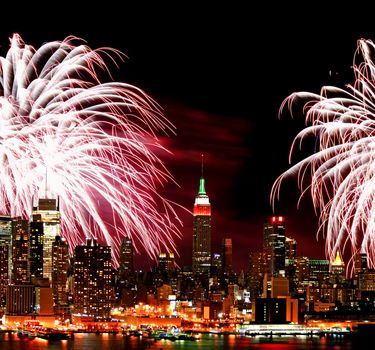 The New York City skyline and holiday fireworks