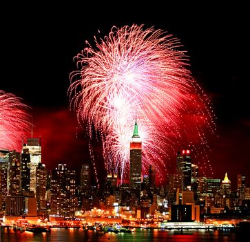 The New York City skyline and holiday fireworks