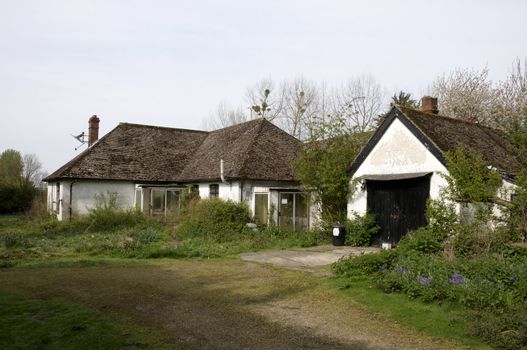 An old run-down and abandoned bungalow in the English countryside