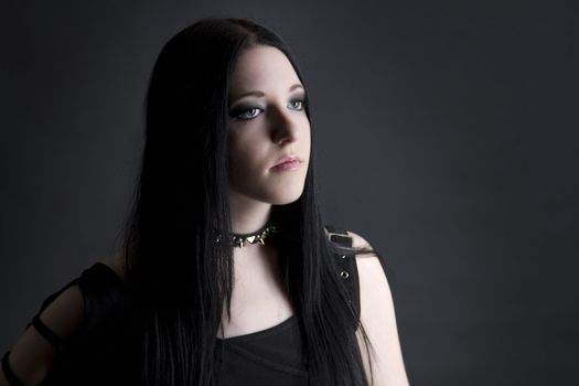 teen girl with black hair and goth style 