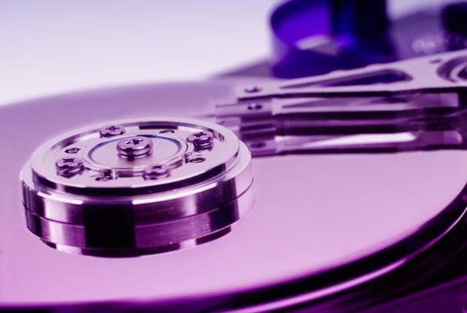 Hard disk on a violet background. Limited DOF.