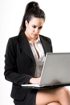 Businesswoman with laptop on white background