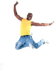 Black strong man jumping on white background. 