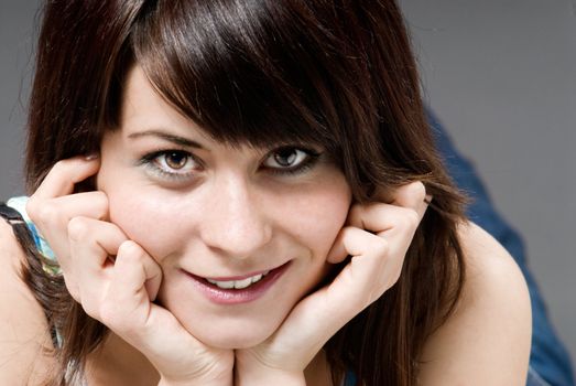 Young brunette girl smiling