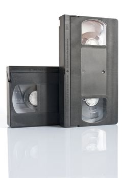 two vhs video cassettes isolated on white background with clipping path