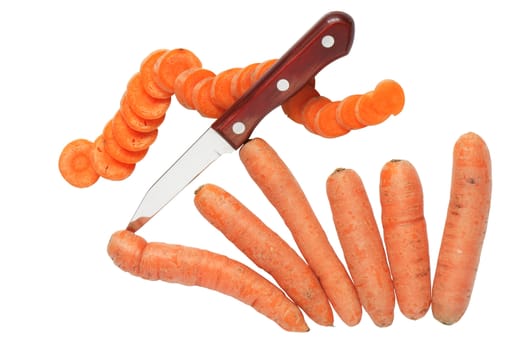 Few carrots, one sliced carrot and knife isolated on white background with clipping path