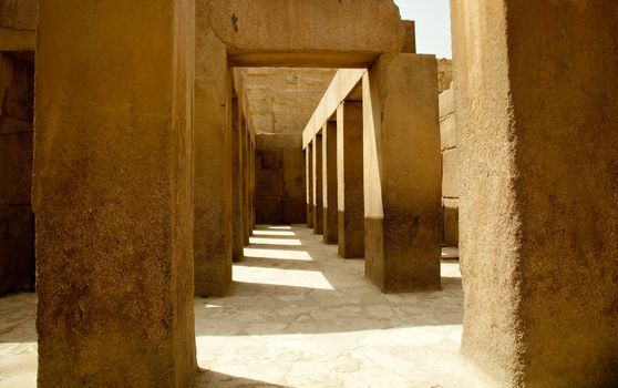 Ancient stone pillars underneath the Spinx near Cairo in Egypt