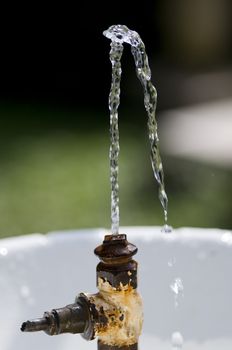 old and rusty water fountain the park