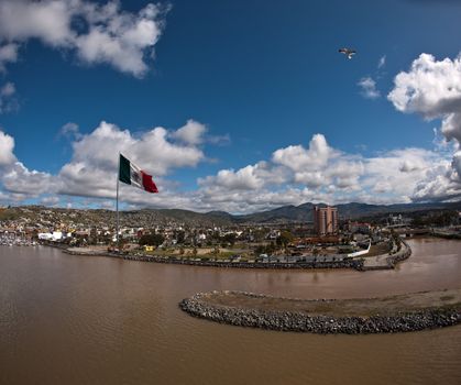 The port of Ensenada Mexico including large Mexican flag